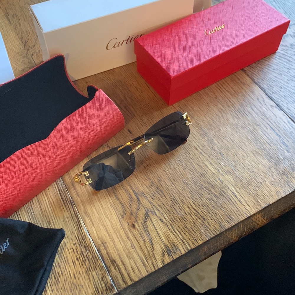 Cartier glasses worn 3 times just not my style.